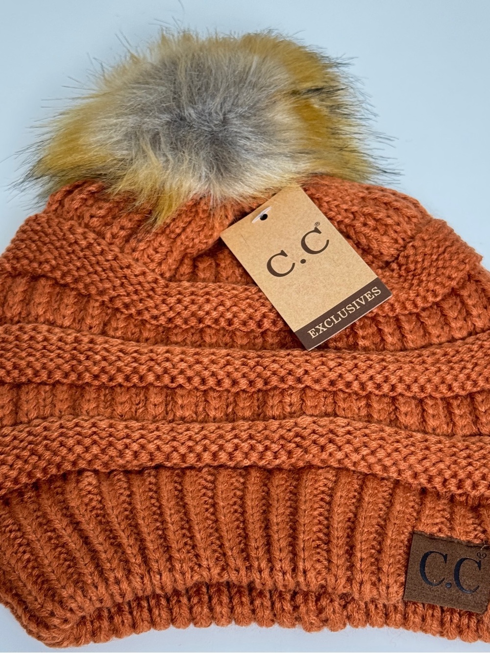 C.C. Exclusives Rust Knit Beanie Faux Fur Pom Winter Hat NWT